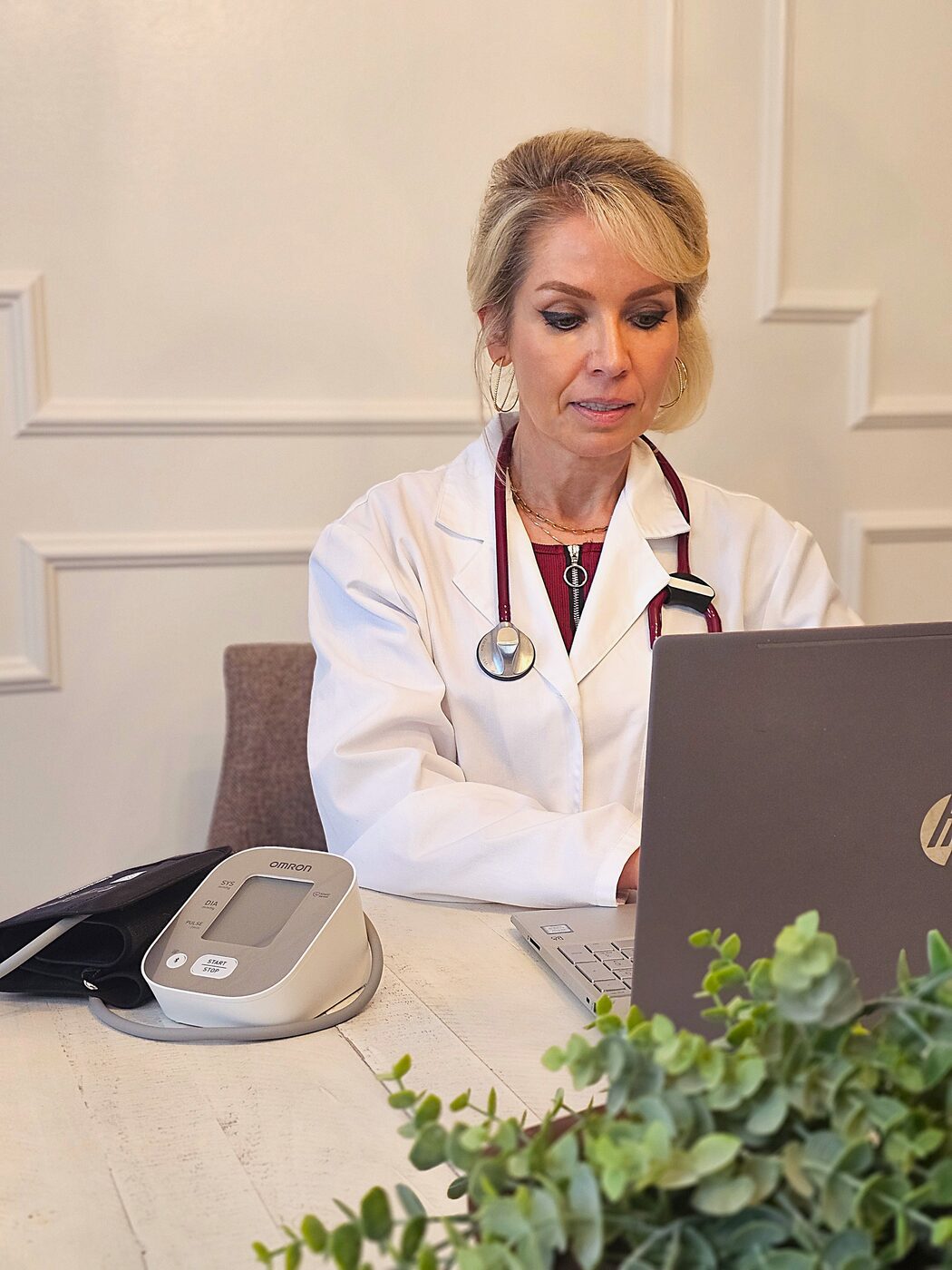 Olga Gray reviewing results with a patient